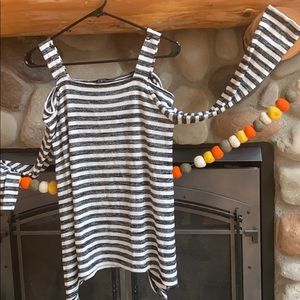 Black and white striped off the shoulder sweater